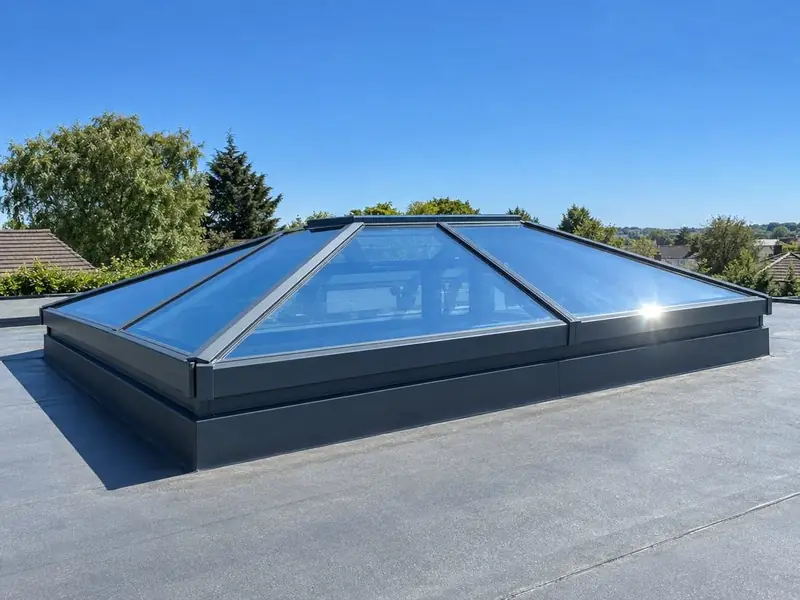Roof lantern with solar-control glass under strong summer sun